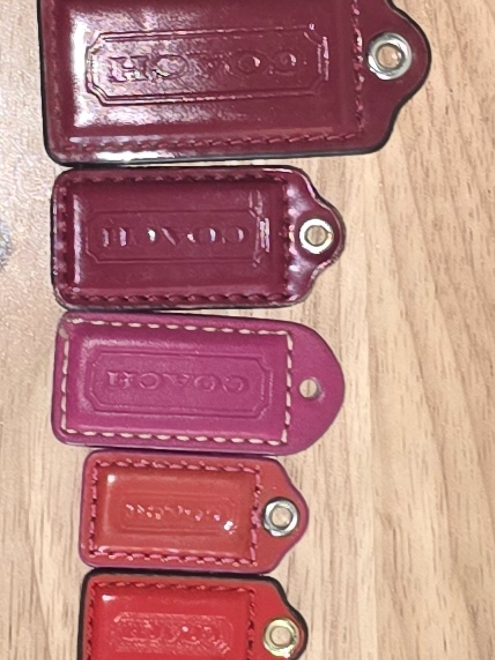 Coach Leather Bag Tag Charms in Burgundy, Pink, Orange, Red